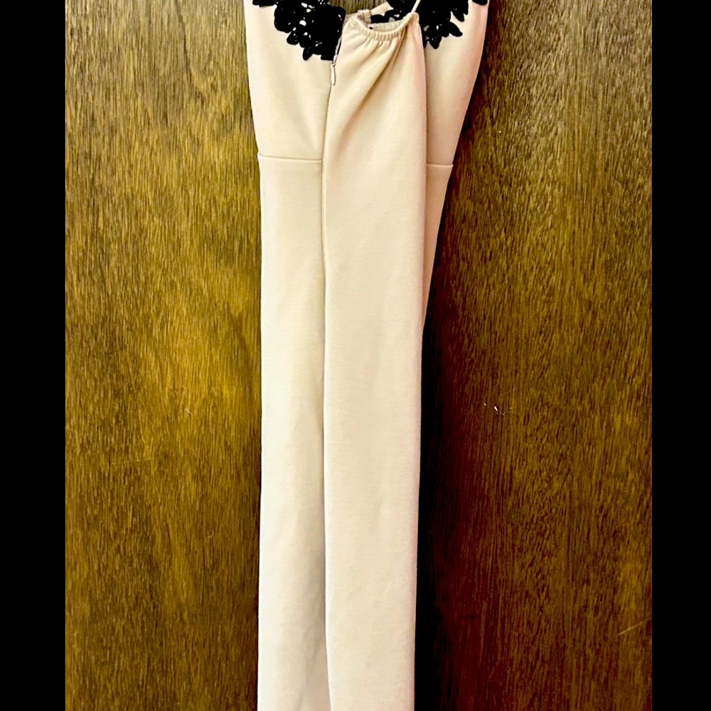 Beautiful tan with black flowers at the chest